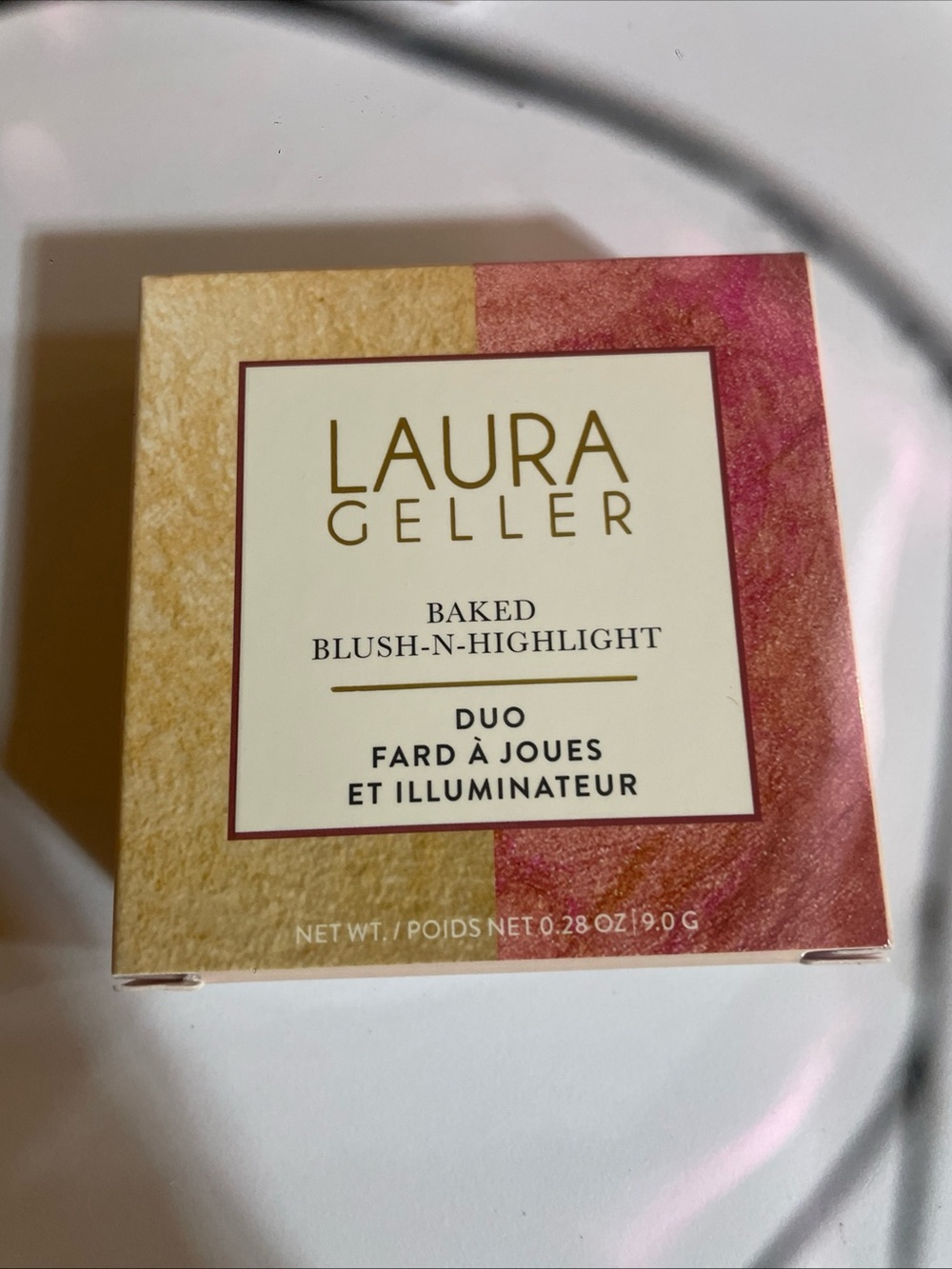 New Laura Geller Baked Blush-N-Highlight Duo